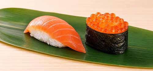 Salmon Nigiri and Ikura Gunkan On Bamboo Leaf