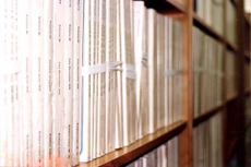 shelf with too many magazines