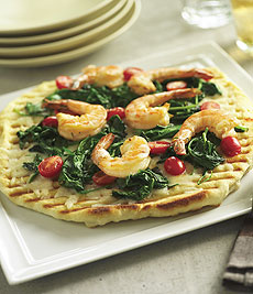 Garlicky Grilled Pizzas With Grilled Shrimp, Feta & Sun-Dried Tomatoes